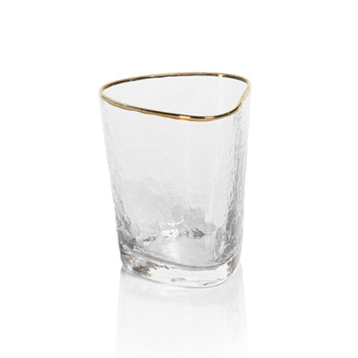 The Hammered Gold Rim Whiskey Glass has a clear textured pattern with gleaming gold rim that's sure to glam up any party. Boasting a simple yet elegant design, this glass is certain to bring eclectic style to any occasion. Great for serving, this whiskey glass is a versatile addition to your glassware collection.