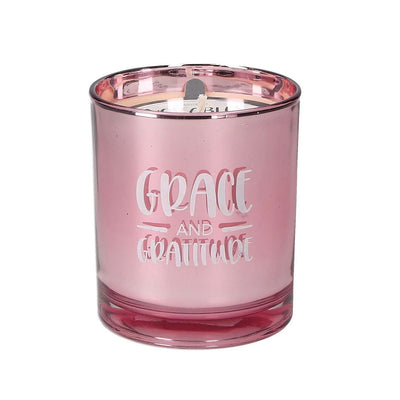 The “Grace and Gratitude” 10.4 oz Candle fuses our beloved Sweet Grace fragrance with an empowering message.