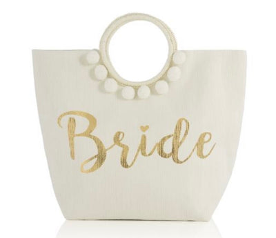 The Bride Tote with Pom Poms is a perfect bag to keep all of your wedding essentials together!  There is  lined zipper pocket for all of your smaller items. After the wedding, use the bag for a super cute honeymoon vacay bag!  Great present for Brides to Be!!