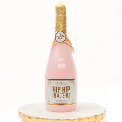 The “Hip Hip Hooray” 34 oz Bellini Bubble Bath is the perfect bottle of bubbly to soak in at night! The gorgeous, champagne-themed bottle contains 34 oz of pink bubble bath that is scented to smell like a Bellini cocktail. Simply pour desired amount into warm water for a relaxing fragrant time.