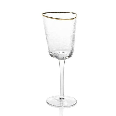 The Hammered Gold Rim Wine Glass is a clear textured pattern with gleaming gold rim wine glass that's sure to glam up any party. Boasting a simple yet elegant design, this glass is certain to bring eclectic style to any occasion. Great for serving a variety of wine, this wine glass is versatile addition to your glassware collection.