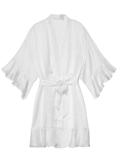 A bridal suite essential, this White Satin Ruffle Robe is the perfect something for the bride to wear while getting ready for the wedding. This robe is a sleek satin essential with feminine flounce sleeves and hem.