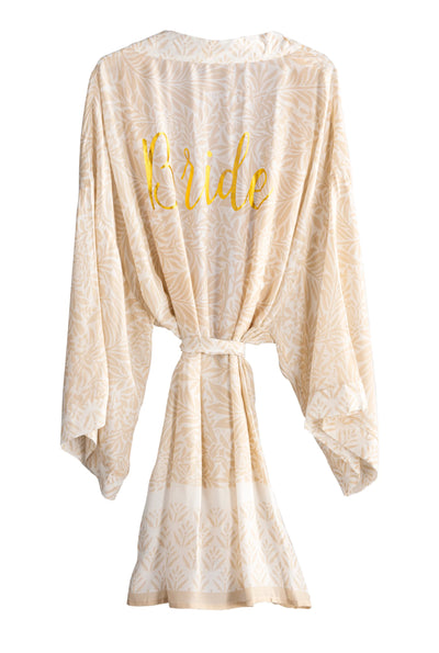 The Posy Bride Kimono Robe in Ivory features gold metallic “Bride” on the back.  Super silky and Soft!  