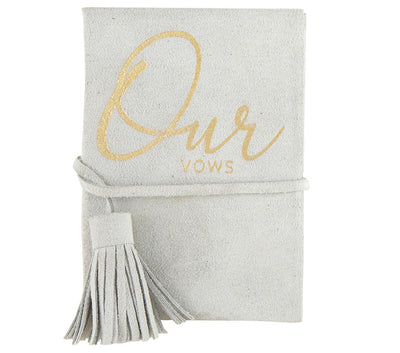“Our Vows” Light Gray Suede Journal.  Say "I Do" with these perfect sized suede vow books. Gold foil detailing creates a classic look on light gray suede. Plenty of pages to write your vows.  Makes a wonderful heirloom to treasure them for years to come.