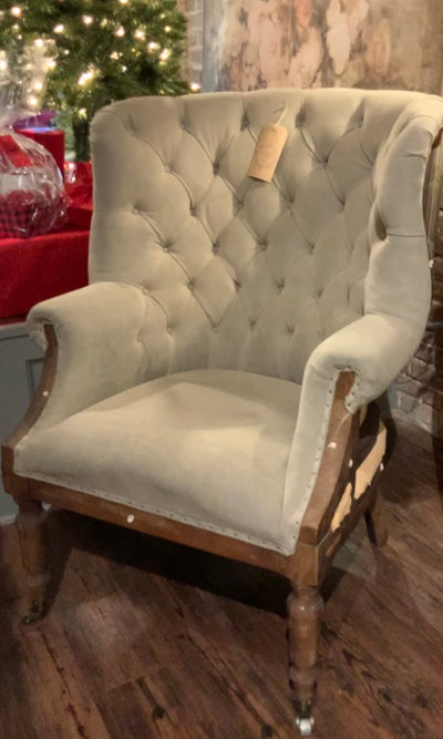 The French style chair is called the Fontaine Wing Back.  It was inspired by a 19th century chair found at a market in Avignon, France. It’s a lovely mix of tufted and curvaceous elegance with deconstructed rugged detailing. The exposed frame, textured burlap back and tufted threads add to the vintage feel. Gray linen fabric upholstery.  