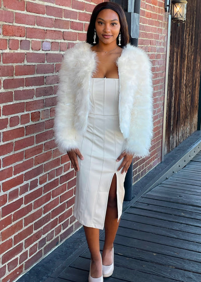 Fluff your stuff with this Cream Jacket of Marabou! This delicious piece features a round neckline, long sleeves, and a cropped hem.  The concealed hook-eye fastenings create an elegant look.  The quality marabou composition is super soft and fully lined!