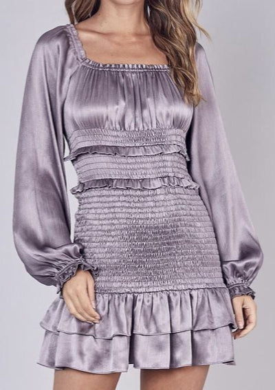 This silver square neck smocked dress is a must have! With a satin-like material, you can look classy and comfy all in one! This shimmery dress will give you beautiful flare for your next party!  100% Polyester