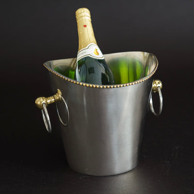 This Aluminum Wine Cooler with Gold Trim is perfect for all your parties!  Makes a great ice bucket as well!  Size 10 x 8.25”