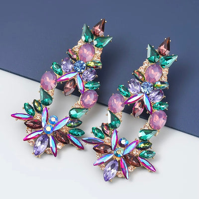 These Large Faux Amethyst and Emerald Rhinestone Earrings will not go unnoticed!  The gorgeous iridescent tones of pink, blue, and green pair perfect with formal gowns!