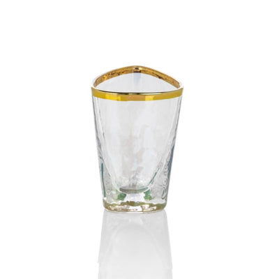The Hammered Gold Rim Shot Glass has a clear textured pattern with gleaming gold rim that's sure to glam up any party. Boasting a simple yet elegant design, this glass is certain to bring eclectic style to any occasion. Great for serving, this shot glass is a versatile addition to your glassware collection.
