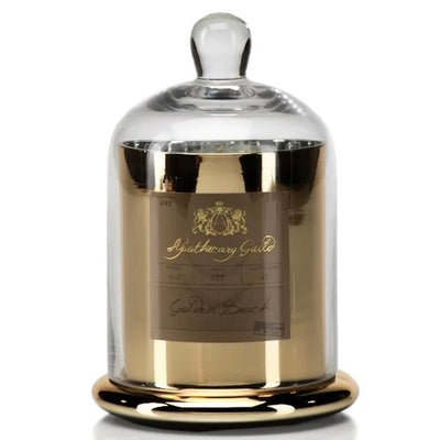 The Apothecary Gold Candle Golden Beach features is beautiful golden jar with a glass dome. This candle is made with the highest quality wax and vegetable blend with 100% bleach free wick. This assures an even, long-burning fragrance with maximum diffusion. 