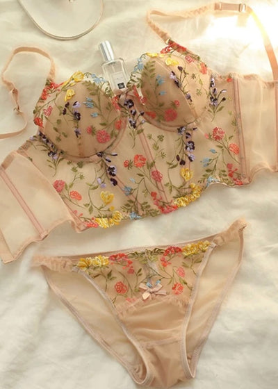 The perfect piece of lingerie for special occasions is this Fall Floral Bustier Set. It has a push-up style corset bra covered with lace and adjustable straps. The panties are brief, seamless, and comfortable to wear. This intimate set features a beautiful floral embroidered detail. 