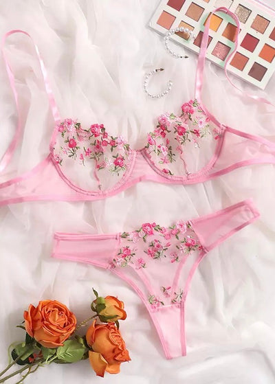 Make any moment deservedly romantic with this pink floral bra set. With contrasting pink and green accents and mesh detail. Bloom into beautiful with this delicate set for an intimate evening. This bra set features underwire and adjustable straps for a comfortable fit.