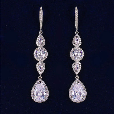 The Rhinestone Teardrop Earrings are beautifully long tear-dropped shaped earrings that will bring any outfit together! You can dress these casually or formally.  With a gorgeous rhinestone detailing, it will add just the right amount of shine to any outfit, formal or wedding gown. 