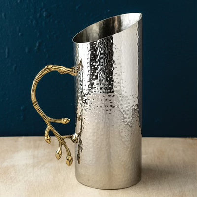 Our Gold Vine Trimmed Pitcher adds elegance for serving your sweet tea to your sangria!   Forget the polishing and just enjoy!  Pair with our other gold vine trimmed pieces for a beautiful setting! Measures 10” tall.
