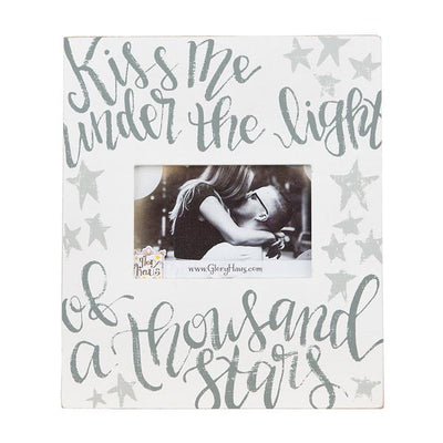This "Kiss Me Under the Light of a Thousand Stars" frame by Glory Haus beautifully portrays a 5x7 photo.  Perfect for every love bird! Each frame comes ready to hang by a keyhole on the back, or sit tabletop with the included peg for easy display.